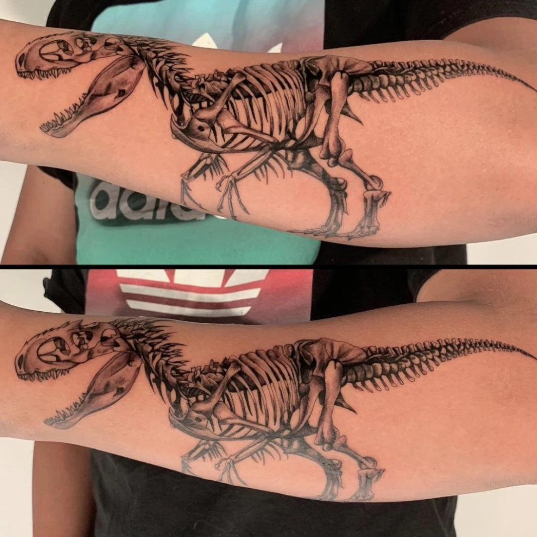 Dinosaur skeleton tattoo by Vegas Vic